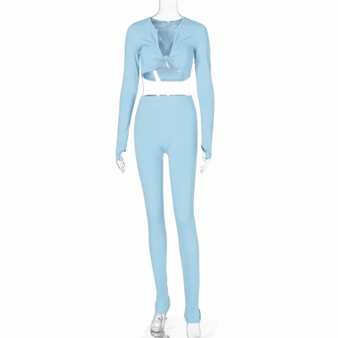 Women's front tie crop top and high waist pant two-piece set, featuring long sleeves, plunge neck, high waist bottom, and slit leg and cuffs detail.